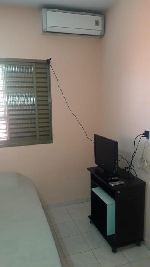 Hospedagem domiciliar Quartos *